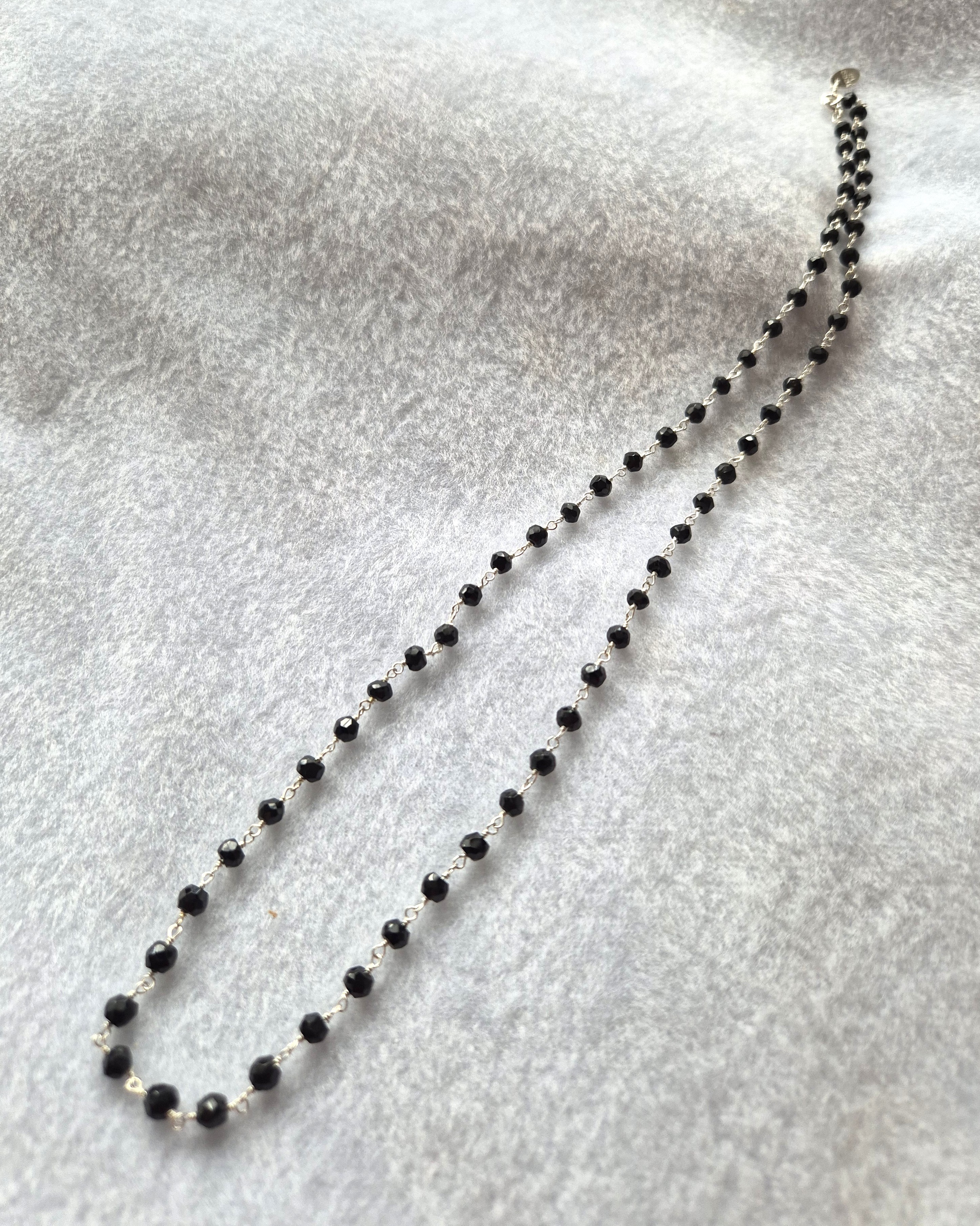 Rosary-linked Black Spinel